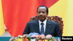 Le président du Cameroun, Paul Biya, lors d'une cérémonie au Grand Hall du Peuple à Pékin, en Chine, le 22 mars 2018.