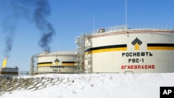 Russia Virus Outbreak Oil AP Explains