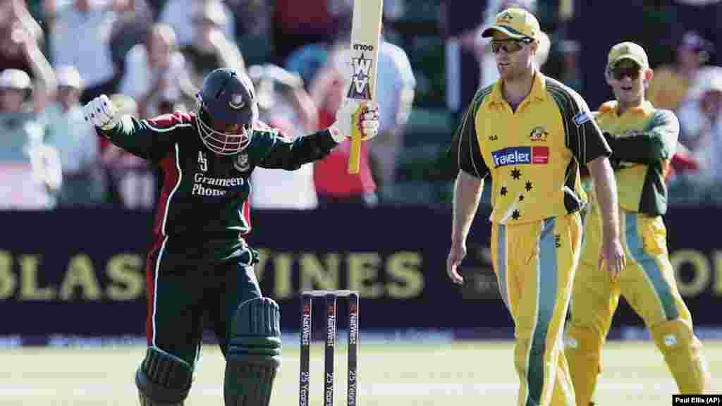 Bangladesh's Mohammed Rafique celebrates beating Australia during their One Day Cricket Test at Sophia Gardens, Cardiff, Wales, Saturday June 18, 2005. The victory by Bangladesh is seen as one of the biggest upsets ever in cricket.
