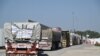 اسرائیل اور فلسطینی عسکریت پسند گروپ حماس کے درمیان جاری تنازعہ کے درمیان 22 دسمبر 2023 کو انسانی امداد لے جانے والے ٹرک مصر سے جنوبی غزہ کی پٹی کے ساتھ کریم شالوم بارڈر کراسنگ کے اسرائیلی جانب پہنچے۔ (تصویر بذریعہ ایلبی
