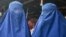 Žene odjevene u burku u Kabulu, Afganistan, 20. prosinca 2021.