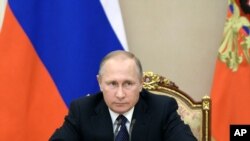 Le président russe Vladimir Poutine au Kremlin, Moscou, Russie, 26 Septembre 2016. (Alexei Nikolsky/Sputnik, Kremlin Pool Photo via AP)