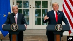 President Donald Trump and European Commission President Jean-Claude Juncker speak in the Rose Garden of the White House, July 25, 2018, in Washington.