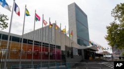 Metal barricades line the shuttered main entrance to the United Nations headquarters in New York, Sept. 18, 2020.