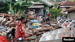 រូបឯកសារ៖ ការខូចខាតបង្កឡើងដោយរលកយក្សស៊ូណាមិនៅប្រទេសឥណ្ឌូនេស៊ីកន្លងទៅ។ 