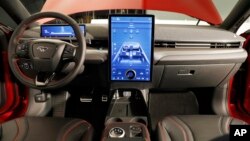 the interior of the new Ford Mustang Mach-E SUV in Warren, Mich. Ford is hoping to score big with the electric SUV for daily drivers that sort of looks like a Mustang performance car. 