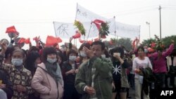 Xitoyda namoyish, hukumat quloq tutdi