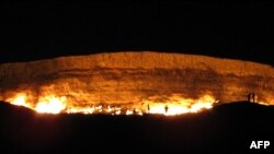 This is not really hell but is "The Gateway to Hell," a huge burning gas crater in the heart of Turkmenistan's Karakum desert. (AP PHOTO 2014)