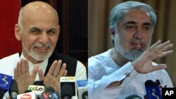 FILE - Afghan presidential candidate Ashraf Ghani (left) at press conference on July 5, 2014. Rival presidential candidate Abdullah Abdullah at a press conference at his residence on July 6, 2014. 