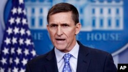 FILE - National Security Adviser Michael Flynn speaks during the daily news briefing at the White House, in Washington, Feb. 1, 2017.