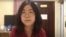 FILE - This image taken from an undated video on Dec. 28, 2020, shows former Chinese lawyer and citizen journalist Zhang Zhan as she broadcasts via YouTube at an unidentified location in China.