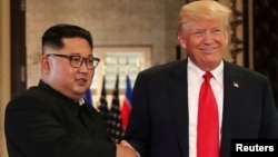 El presidente Donald Trump y el líder norcoreano, Kim Jong Un, se reunieron por primera vez en Singapur, el 12 de junio de 2018.