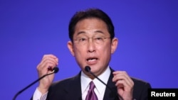 日本首相岸田文雄在联合国气候变化会议上讲话（路透社2021年11月2日）REUTERS/Hannah McKay/Pool