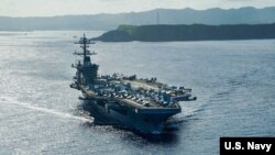 美军“罗斯福”号（USS Theodore Roosevelt）航母2020年5月21日驶离关岛，前往菲律宾海执行任务。
