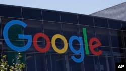 FILE - A Google logo is seen at the company's headquarters in Mountain View, California, July 19, 2016.