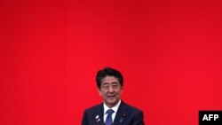 FILE - Japan's Prime Minister Shinzo Abe delivers a speech in Tokyo, July 24, 2019. 