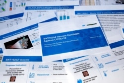 Documents created by Pfizer for the meeting with the Food and Drug Administration advisory panel, as Pfizer seeks approval for mass use of its COVID-19 vaccine, are seen Dec. 10, 2020.