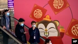 香港許多民眾近日來戴口罩上街。（美聯社2020年1月21日）