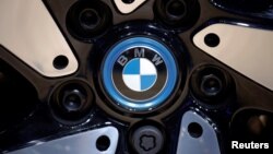 FILE PHOTO: The BMW logo is seen on the wheel of a vehicle presented at the Auto China 2016 auto show in Beijing, April 29, 2016. 