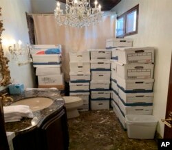 This image, contained in the indictment against former President Donald Trump, shows boxes of records stored in a bathroom and shower in the Lake Room at Trump's Mar-a-Lago estate in Palm Beach, Florida.