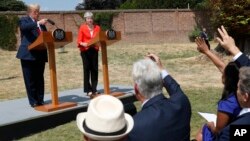 El presidente de EE.UU., Donald Trump, y la primera ministra de Gran Bretaña, Theresa May, ofrecieron una conferencia de prensa conjunta en Londres tras su runión el viernes, 13 de julio de 2018.