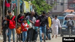 Isroilning evakuatsiya haqidagi buyrug'idan so'ng falastinliklar Rafahni tark etmoqda