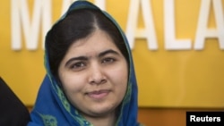 A supporter of the opposition National Super Alliance (NASA) wears oranges during a protest calling for the sacking of election board officials involved in August's cancelled presidential vote, in Nairobi, Kenya.