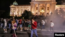 Demonstrators take part in a protest against a lockdown planned for the capital this weekend to halt the spread of the coronavirus disease (COVID-19) in Belgrade, Serbia, July 7, 2020.