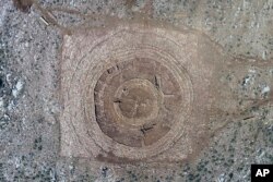 FILE - In this undated photo provided by the Greek Culture Ministry on Tuesday, June 11, 2024, the ruins of a 4,000-year-old hilltop building newly discovered on the island of Crete are seen from above. (Greek Culture Ministry via AP)