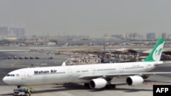 ፎቶ ፋይል፦ ኤርባስ ኤ340 የማሃን አየር በዱባይ ዓለም አቀፍ አውሮፕላን ማረፊያ እአአ መስከረም 14/2017
