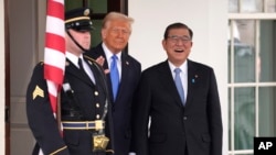  အမေရိကန်သမ္မတ Donald Trump နဲ့ ဂျပန်ဝန်ကြီးချုပ် Shigeru Ishiba (AP Photo/Evan Vucci)