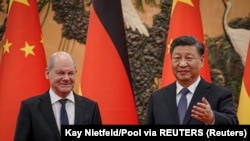 Chansela Scholz na mwenyeji wake Rais Xi Jinping