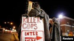 Missuri shtatining Ferguson shahri beqaror - irqchilikka qarshi namoyishlar