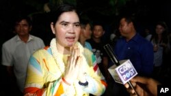 A prominent leader of Cambodia's land rights activist Tep Vanny, upon arrival at her home in Boeung Kak, in Phnom Penh, Aug. 20, 2018.