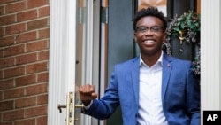 Rick Hart, a volunteer for the Democratic presidential candidate former Vice President Joe Biden, at his family's home in Laurel, Md., Sunday, Aug. 16, 2020. Colleges are reopening with more online learning, and that's proving a challenge for political ca