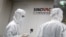 People work in a laboratory of Chinese vaccine maker Sinovac Biotech, developing an experimental COVID-19 vaccine, during a government-organized media tour in Beijing, China, Sep. 24, 2020.