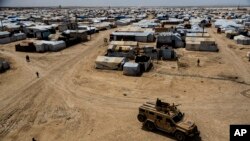 Dîmeneke kampa Holê.