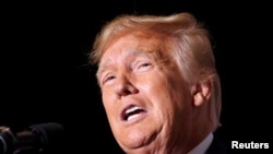 ARCHIVO: El expresidente de EEUU Donald Trump durante un evento de campaña en Iowa el 7 de julio de 2023.