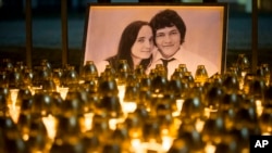 A memorial in Bratislava, Slovakia, for murdered journalist Jan Kuciak and his girlfriend, Martina Kusnirova, is seen in this Feb. 28, 2018, photo.