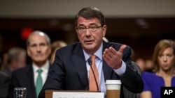 Ashton Carter, President Barack Obama’s choice to be defense secretary, testifies before the Senate Armed Services Committee hearing on his nomination to replace Chuck Hagel as Pentagon chief, on Capitol Hill, Washington, Feb. 4, 2015.