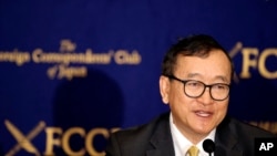 Cambodia's self-exiled opposition leader Sam Rainsy speaks during a press conference in Tokyo, Friday, April 13, 2018. Rainsy urged Japan, his nation's biggest donor, to use its leverage and convince the autocratic government to make sure that the July election is democratic. (AP