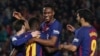 Ousmane Dembele, Lionel Messi, Yerry Mina et Luis Suarez du FC Barcelone, heureux de leur cinquième but contre Villarreal le 9 mai 2018.