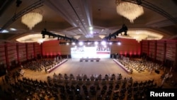 FILE - A general view shows talks between the Afghan government and Taliban insurgents underway in Doha, Qatar, Sept. 12, 2020.