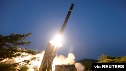 A view shows the testing of what local media call a super-large multiple rocket launcher in North Korea, in this undated photo released on March 28, 2020 by North Korea's Korean Central News Agency (KCNA). KCNA via REUTERS ATTENTION EDITORS -…