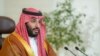 Putra Mahkota Arab Saudi Mohammed bin Salman menyampaikan pidato dari kantornya dalam upacara pembukaan Forum Inisiatif Hijau Arab Saudi di Riyadh, Arab Saudi, pada 23 Oktober 2021. (Foto: Bandar Algaloud/Courtesy of Saudi Royal Court/Handout via Reuters)