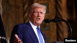 FILE PHOTO: U.S. President Donald Trump addresses the media at Mar-a-Lago