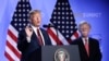 FILE - President Donald Trump, left, is flanked by national security adviser John Bolton, right during a press conference after a summit of heads of state and government at NATO headquarters in Brussels, Belgium, July 12, 2018.
