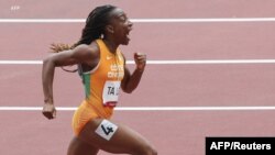 Mwanariadha wa Ivory Coast Marie-Josee Ta Lou aliweka rekodi mpya kwa wanawake katika mita 100 huko Tokyo Japan.(AFP)