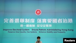 香港特首林鄭月娥在星期四傍晚會見記者談論中國人大改變香港立法會選舉制度（路透社照片）